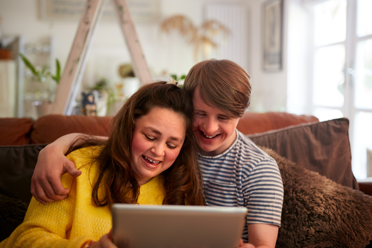 A couple with learning disability enjoying time together at home in Nottingham A learning disability couple use supported living care to live more independently in Nottingham