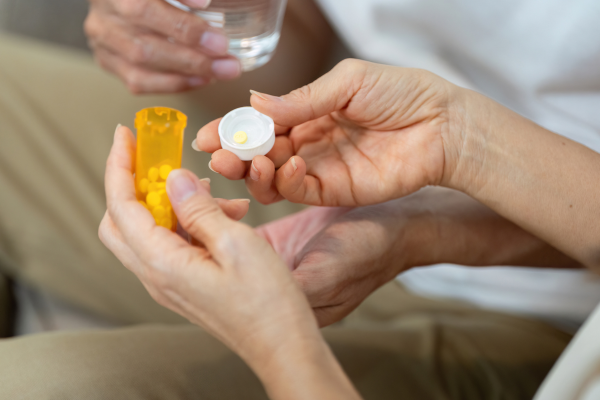 Home carer issuing medication management with elderly client at home in Nottingham We make sure medication is never missed, muddled, or something you have to worry about.
